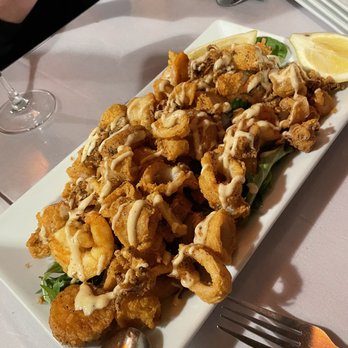 Rino's Place - mixed seafood - scallop, shrimp & calamari - Italian Near Me - Boston, Massachusetts Rino's Place - mixed seafood - scallop, shrimp & calamari - Italian Near Me - Boston, Massachusetts