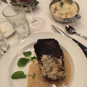 The Capital Grille - Bone-In Kona Crusted Dry Aged NY Strip* Sam's Mashed Potatoes - Steakhouses Near Me - Naples, Florida
