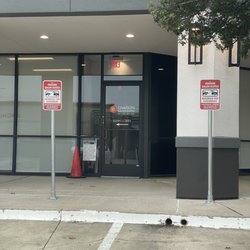 Hello Sugar | Preston Trails - Brazilian Wax & Sugar Salon - Parking and sign indicating to walk around to enter the side opposite Campbell Rd