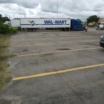 TA - Travel center parking lot. Guy was cleaning up the parking lot. Working hard to keep the place suitable for their customers. - Service Stations Near Me - Baldwin, Florida