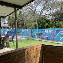Neighborhood BarK & Boutique - Dog playground