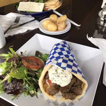 Santorini Cafe - Greek salad with lamb at the top, lamb gyro at the bottom and some loukoumades to top it off - Greek Near Me - Austin, Texas