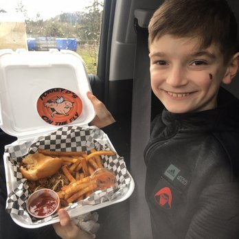 Porkey D'S - a boy holding a tray of food - Food Trucks Near Me - Blanchard, Idaho Porkey D'S - a boy holding a tray of food - Food Trucks Near Me - Blanchard, Idaho