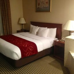 King bed suite with jacuzzi tub in room. King bed suite with jacuzzi tub in room.