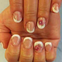 Milwaukee Area Technical College - $16 for gel nails with decorated gel nail polish, hand massage, & parafin dip.