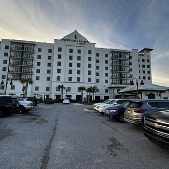 SpringHill Suites by Marriott Navarre Beach - The front entrance and parking lot. - Hotels Near Me - Navarre, Florida SpringHill Suites by Marriott Navarre Beach - The front entrance and parking lot. - Hotels Near Me - Navarre, Florida