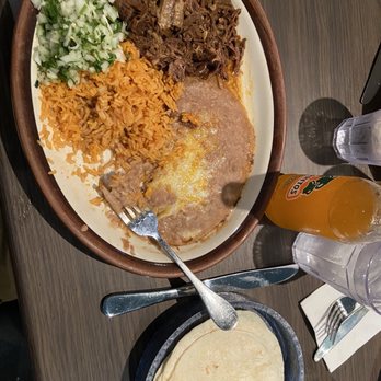 El Talpense Mexican Restaurant - Birria with rice and beans, plus flour tortillas. Mandarin jarritos for the drink. - New Mexican Cuisine Near Me - Lafayette, California El Talpense Mexican Restaurant - Birria with rice and beans, plus flour tortillas. Mandarin jarritos for the drink. - New Mexican Cuisine Near Me - Lafayette, California