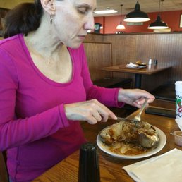 Got the Bar-B-Que baked potato. It doesn't come with sour cream but you can buy it from them for a little more than $.30 a small packet.