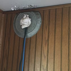 Bucks Lake Lodge - This was above the stove. The paper towel was plugging up the whole to the outside this was connected to the water heater