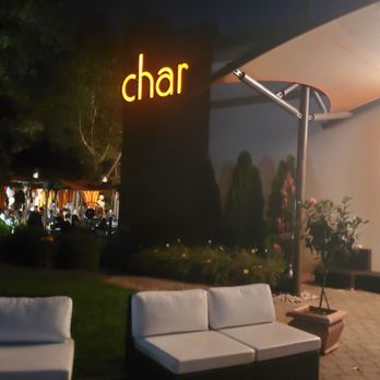 Char Steakhouse - the outside seating area at night - Steakhouses Near Me - Raritan, New Jersey