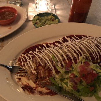 Los Huesos - a plate of enchilada and a salad - Mexican Near Me - Vernon, British Columbia