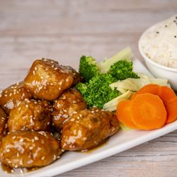 Loving Hut - Soy protein, battered and fried, with a house-special brown sauce; served with steamed broccoli & rice