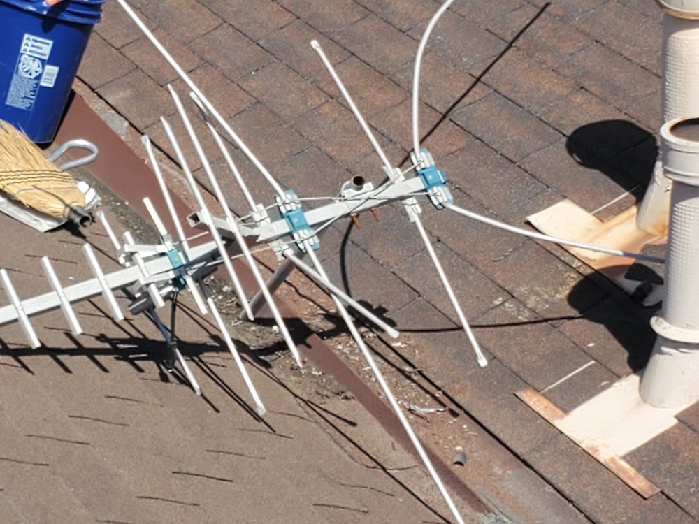 Slide of Mikes Roofing