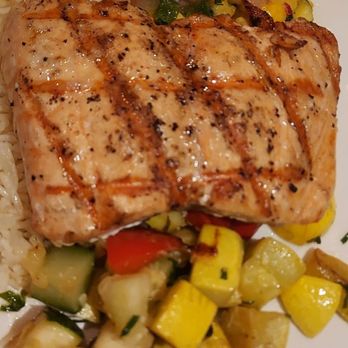 Redstone American Grill - Salmon with veggies on white rice - Steakhouses Near Me - National Harbor, Maryland Redstone American Grill - Salmon with veggies on white rice - Steakhouses Near Me - National Harbor, Maryland