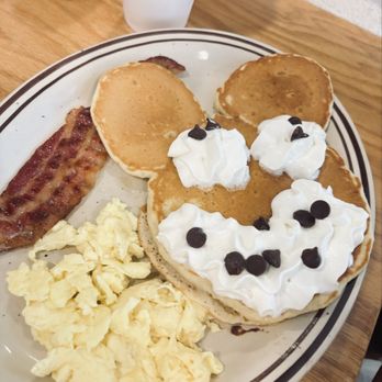 Classic BJ's Cafe - Silly face pancake breakfast with eggs and bacon - New American Near Me - Euless, Texas