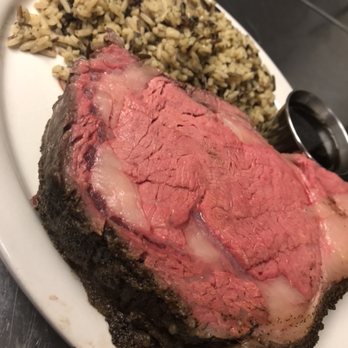 The Ridge - a plate of meat and rice - Bars Near Me - La Crosse, Wisconsin