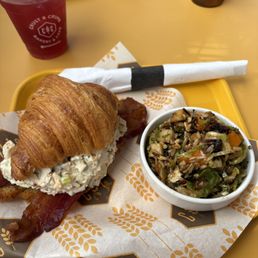 chicken salad sandwich and a side of pilaf rice salad