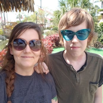 Smugglers Cove Adventure Golf - Despite his teenage "let's get this photo over with" face, Smugglers Cove is his favorite Florida hot spot. - Mini Golf Near Me - Madeira Beach, Florida Smugglers Cove Adventure Golf - Despite his teenage "let's get this photo over with" face, Smugglers Cove is his favorite Florida hot spot. - Mini Golf Near Me - Madeira Beach, Florida