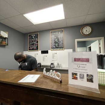 Faith Nutrition - a man sitting at a counter - Juice Bars & Smoothies Near Me - Pantego, Texas Faith Nutrition - a man sitting at a counter - Juice Bars & Smoothies Near Me - Pantego, Texas
