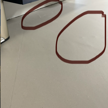 Nathan's Carpet - They left PEBBLES under the vinyl!! Bubbling under the cabinet. - Carpet Installation Near Me - Miami, Florida Nathan's Carpet - They left PEBBLES under the vinyl!! Bubbling under the cabinet. - Carpet Installation Near Me - Miami, Florida