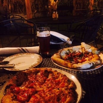 Forager Brewery - A "make your own" pizza with peppers, onions, tomatoes, and a margarita pizza. - Breweries Near Me - Rochester, Minnesota Forager Brewery - A "make your own" pizza with peppers, onions, tomatoes, and a margarita pizza. - Breweries Near Me - Rochester, Minnesota