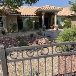 The large red rock makes the yard pop!! The large red rock makes the yard pop!!