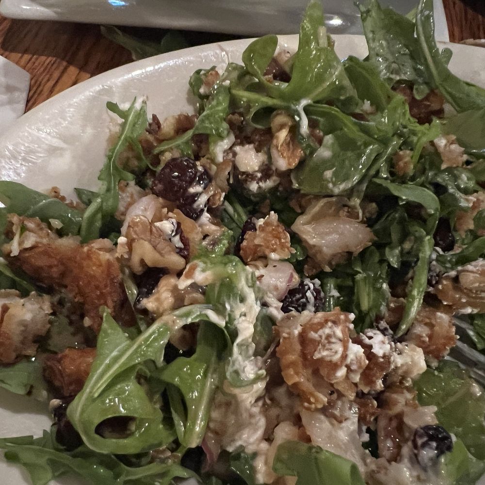 Arugula salad with coconut shrimp