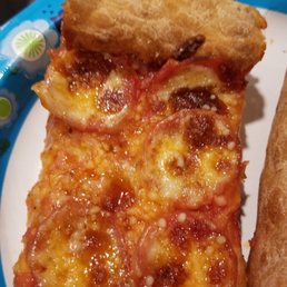 two slices of pizza on a paper plate two slices of pizza on a paper plate