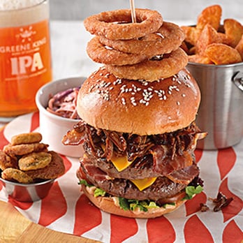 The Windmill Inn - We've got a brand new menu! Our Big Daddy Burger served with wedges and onion rings - Pubs Near Me - Stoke-on-Trent, STS The Windmill Inn - We've got a brand new menu! Our Big Daddy Burger served with wedges and onion rings - Pubs Near Me - Stoke-on-Trent, STS