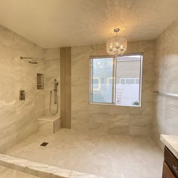 702 Pro Flooring - a bathroom with a walk in shower - Flooring Near Me 702 Pro Flooring - a bathroom with a walk in shower - Flooring Near Me