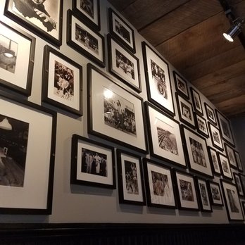 First & Last Tavern - a wall of black and white photographs - Bars Near Me - Glastonbury, Connecticut First & Last Tavern - a wall of black and white photographs - Bars Near Me - Glastonbury, Connecticut