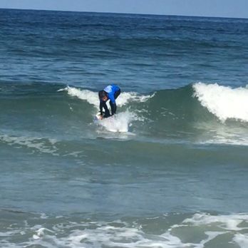 Pacific Surf School - Catching his balance - Surfing Near Me - San Diego, California Pacific Surf School - Catching his balance - Surfing Near Me - San Diego, California