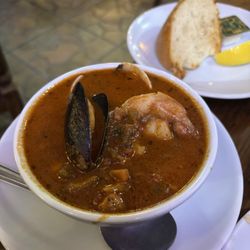 Solana Beach Fish House - Bowl of cioppino - soup like with tiny bit of heat.  Clam, mussel, fish and scallops