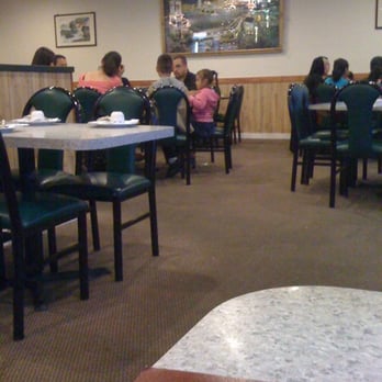 A fiberoptic lighted Mecca adorns the wall