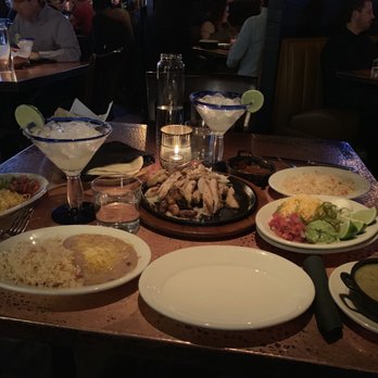 Savina's - "Grilled Fajitas" for two included steak, chicken, and 4 large shrimp! Added on the rice and beans. The green chili rocked! - Mexican Near Me - Denver, Colorado Savina's - "Grilled Fajitas" for two included steak, chicken, and 4 large shrimp! Added on the rice and beans. The green chili rocked! - Mexican Near Me - Denver, Colorado