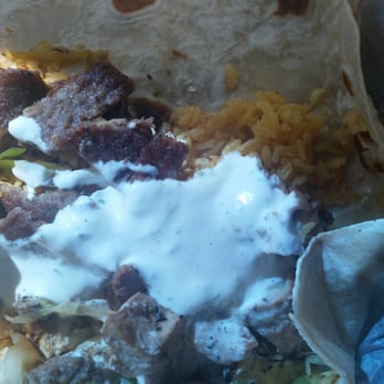 GriDeli's North - My Greek burrito, open face to put in the yogurt sauce.  Which by the way is made here from scratch and is super yummy. - American Near Me - Marriott-Slaterville, Utah