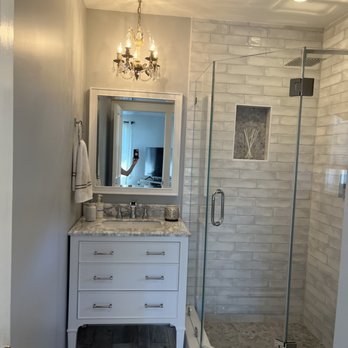 Phil's Handy Service - a bathroom with a walk in shower - Handyman Near Me - Tampa, Florida Phil's Handy Service - a bathroom with a walk in shower - Handyman Near Me - Tampa, Florida
