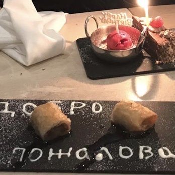 AMBAR Restaurant, Clarendon - Baklava saying "welcome" in Russian - Modern European Near Me - Arlington, Virginia