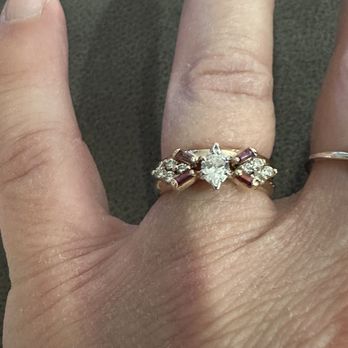 TQ Jewelers - After repairs. With purple sapphires to replace the chipped emeralds. - Jewelry Near Me - Rancho Cucamonga, California TQ Jewelers - After repairs. With purple sapphires to replace the chipped emeralds. - Jewelry Near Me - Rancho Cucamonga, California