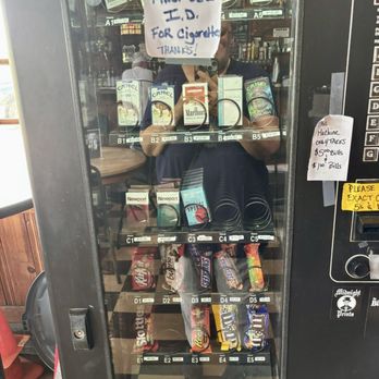 Old Point Bar - A combo cigarette and candy machine! - Dive Bars Near Me - New Orleans, Louisiana