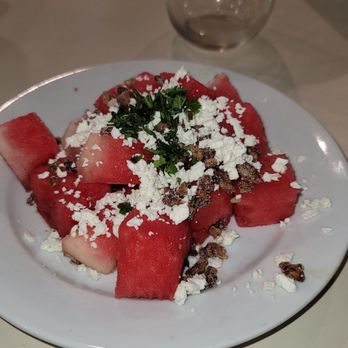 Reginelli's Pizzeria - Cubed watermelon with feta cheese, diced mint, and candied pecans Perfect Summertime dessert! - Pizza Near Me - Gretna, Louisiana Reginelli's Pizzeria - Cubed watermelon with feta cheese, diced mint, and candied pecans Perfect Summertime dessert! - Pizza Near Me - Gretna, Louisiana