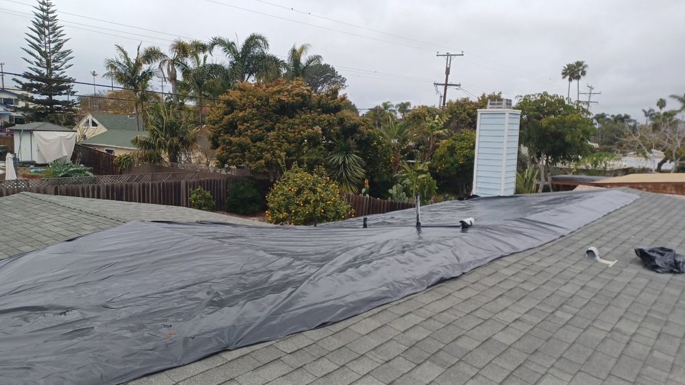 Slide of The Roof Masters