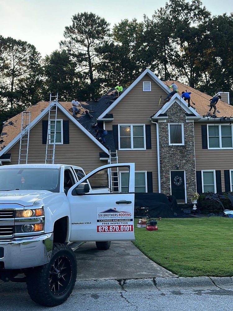 Slide of Six Brothers Roofing
