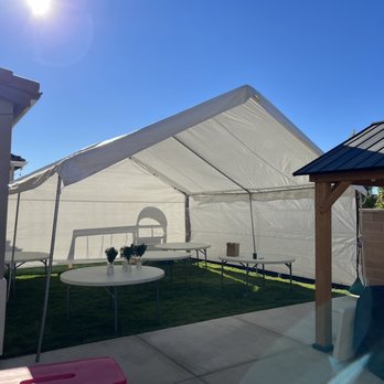 M A Party Rentals - 20 by 20 Tent with side walls, round tables and white fold chairs - Bounce House Rentals Near Me M A Party Rentals - 20 by 20 Tent with side walls, round tables and white fold chairs - Bounce House Rentals Near Me