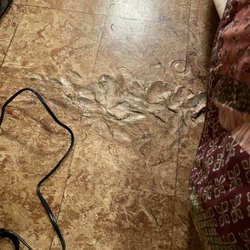 MacArthur House and Cabins - Melted floor. From what? I don't want to know.