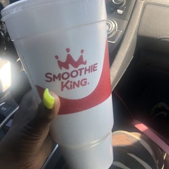 Smoothie King - a hand holding a cup of smoothie - Health Markets Near Me - Charlotte, North Carolina Smoothie King - a hand holding a cup of smoothie - Health Markets Near Me - Charlotte, North Carolina