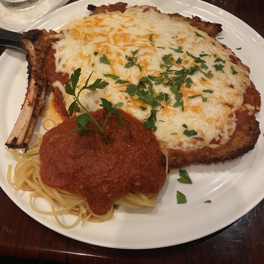 Parmesan Pete's Italian Kitchen - 10z veal chop Parmesan - Italian Near Me - Naples, Florida Parmesan Pete's Italian Kitchen - 10z veal chop Parmesan - Italian Near Me - Naples, Florida