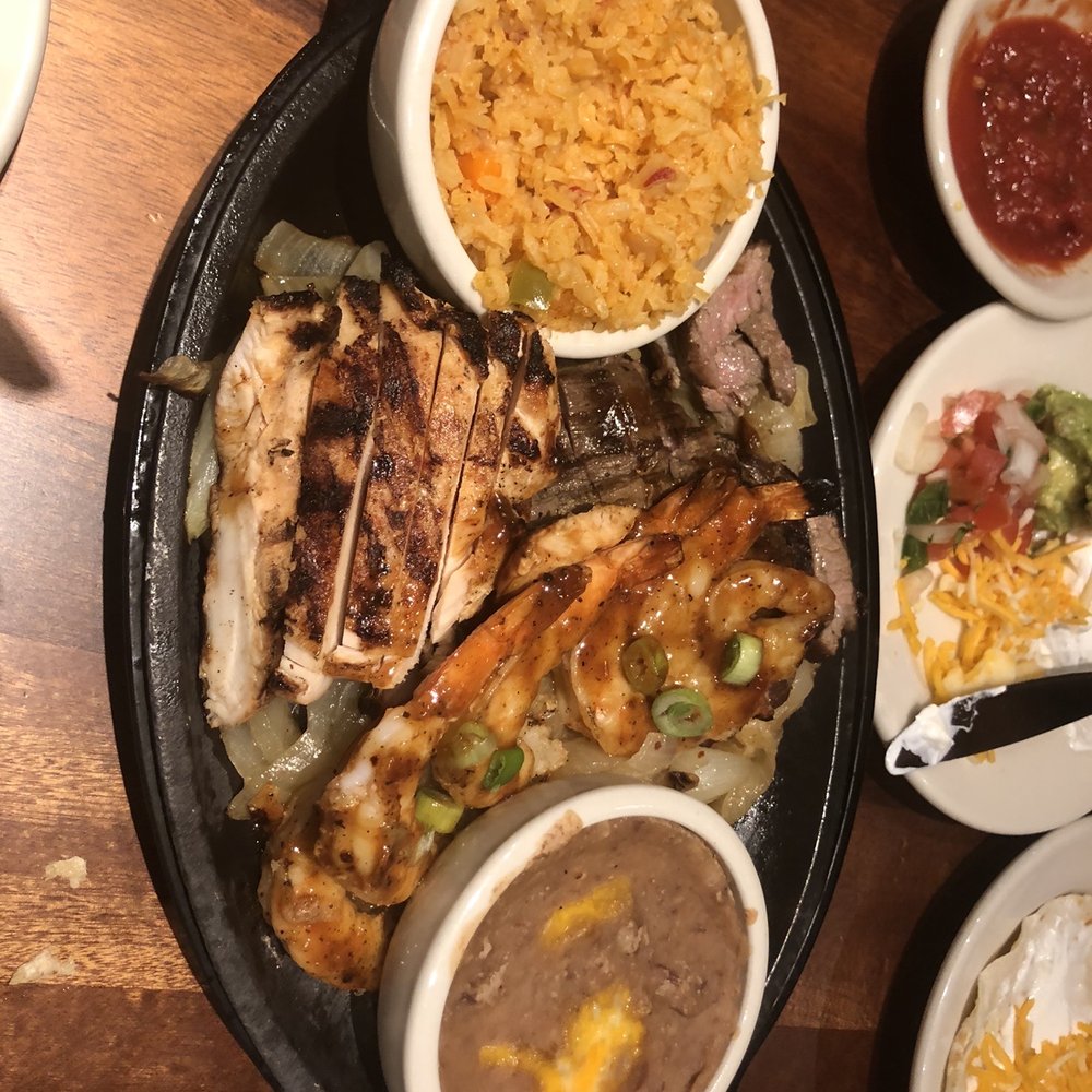 Abuelo's Mexican Restaurant - Fajita Trio (chicken, beef, & shrimp) - Mexican Near Me - Lubbock, Texas Abuelo's Mexican Restaurant - Fajita Trio (chicken, beef, & shrimp) - Mexican Near Me - Lubbock, Texas