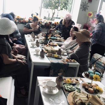 The Tea Room Experience - The setting of people around the table. - Tea Rooms Near Me - Orlando, Florida