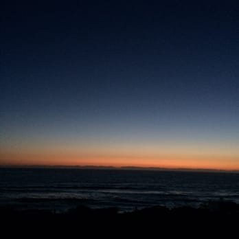 Sand Pebbles Inn - Patio sunset - Hotels Near Me - Cambria, California Sand Pebbles Inn - Patio sunset - Hotels Near Me - Cambria, California